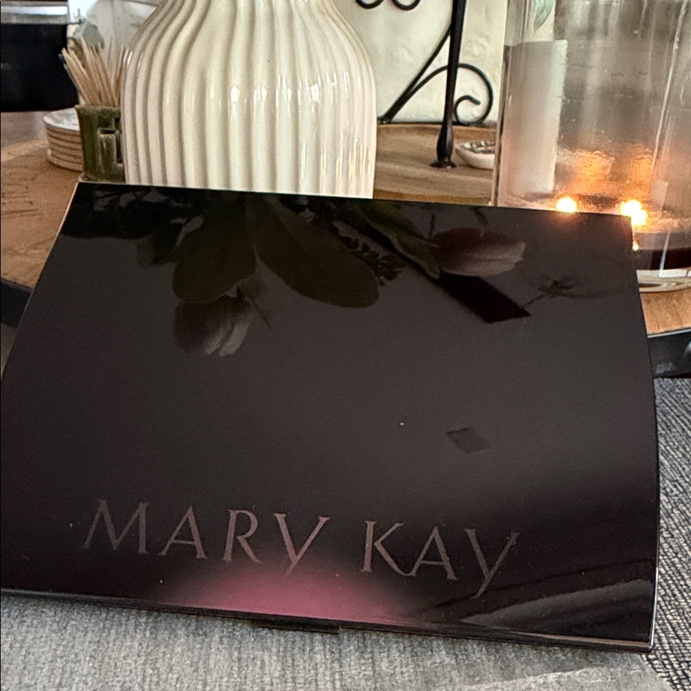 Mary Kay Black Compact with Subtle Pink Reflection